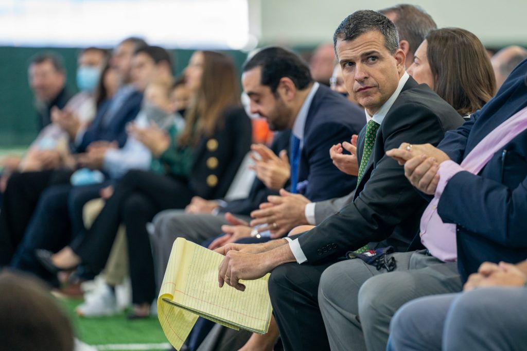 Head coach Mario Cristobal reviews his notes before giving his introductory remarks in the Carol Soffer Indoor Practice Facility on Dec. 7, 2021.