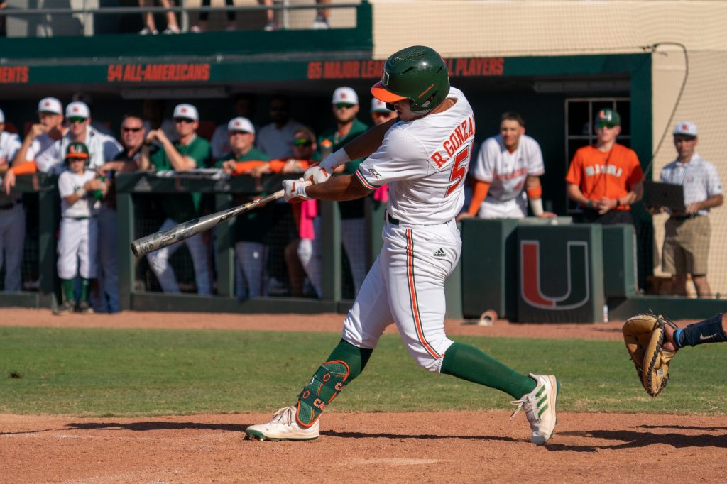 Freshman outfield/infielder Renzo Gonzalez hits a single up the middle, batting in sophomore outfielder Jacob Burke to earn the Canes a 3-2 victory over the Tarheels, in the bottom of the 14th inning of Miami’s game versus the University of North Carolina at Chapel Hill at Mark Light Field on March 27, 2022.