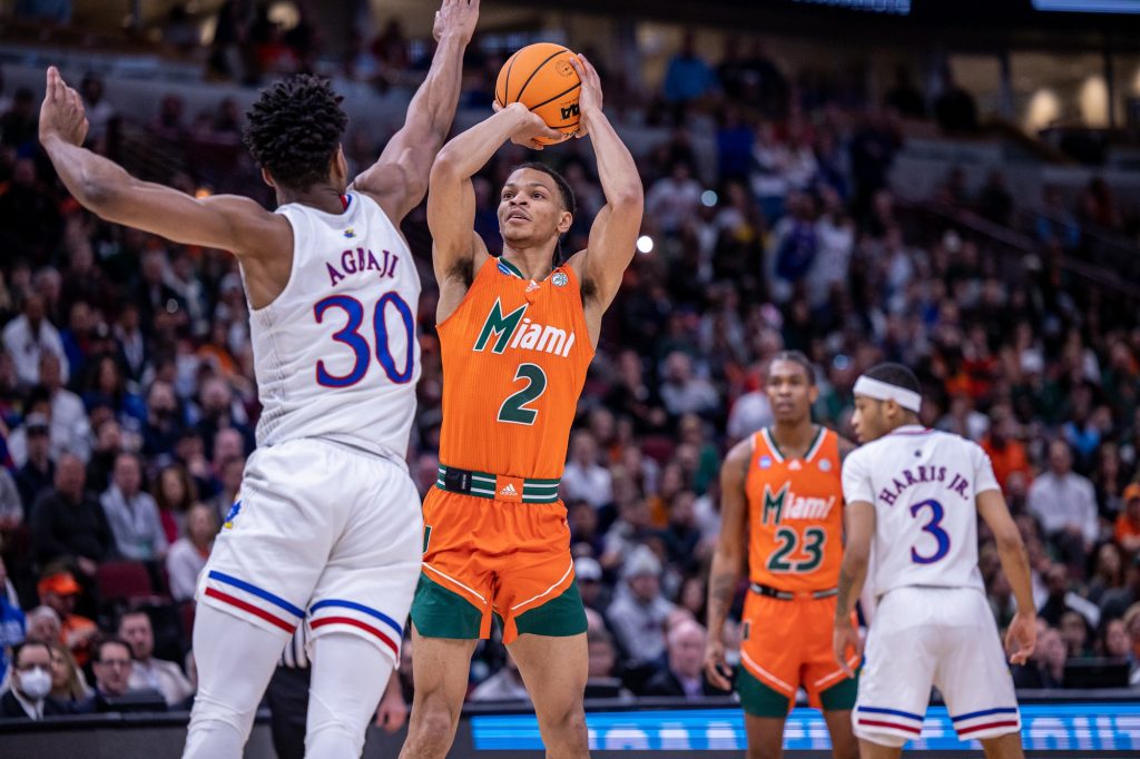 Third-year sophomore Isaiah Wong pulls up for a shot during Miami's loss to Kansas in the Elite Eight at the United Center in Chicago on Sunday, March 27, 2022.