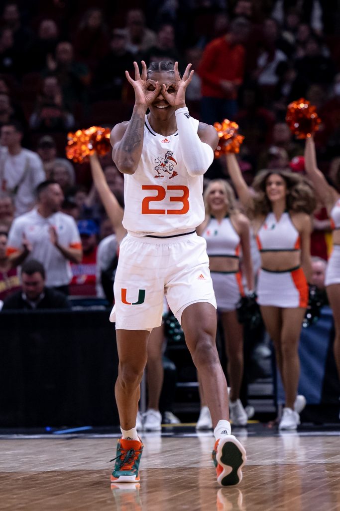 Sixth-year redshirt senior Kameron McGusty celebrates after hitting a three-point shot in the first half of Miami's win over Iowa State in the Sweet 16 at the United Center in Chicago on Friday, March 25, 2022. McGusty led all players with 27 points while also adding four steals.