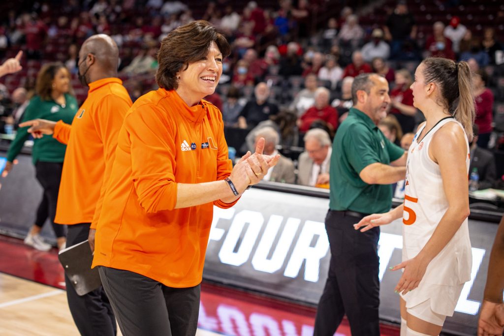 Miami coach Katie Meier encourages her team in Miami's 78-66 win over South Florida in the first round of the NCAA Tournament on Friday, March 18, 2022 at Colonial Life Arena in Columbia, South Carolina.