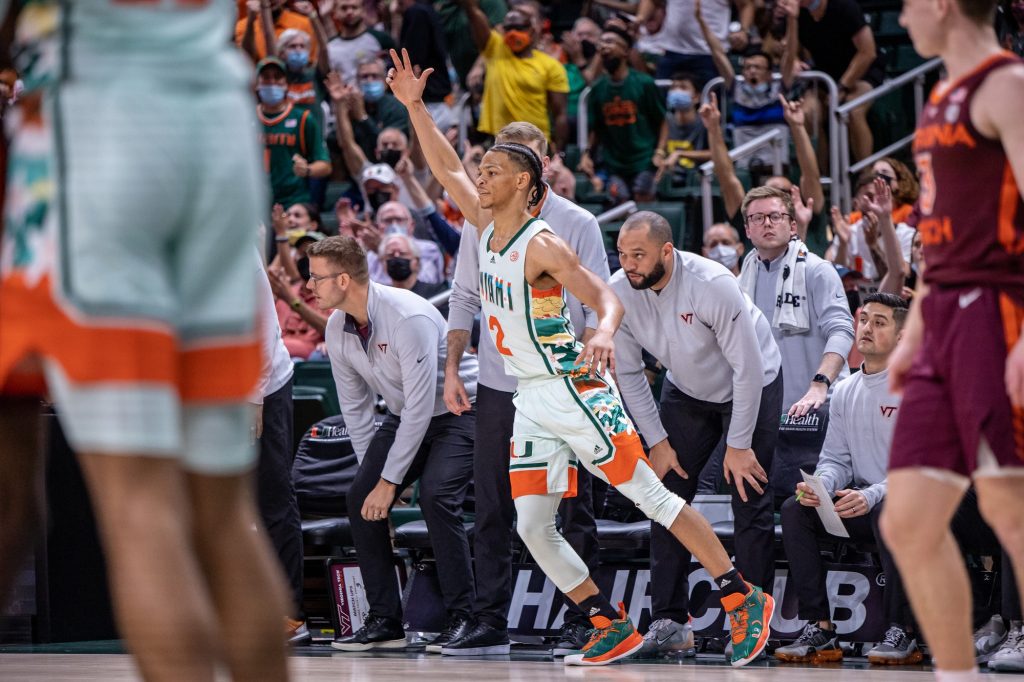 Third-year sophomore Isaiah Wong celebrates after hitting a three point shot at the buzzer at the end of the first half against Virginia Tech on Saturday, Feb. 26, 2022 at the Watsco Center. Wong scored 13 points and added three rebounds and three assists in Miami's 71-70 loss.