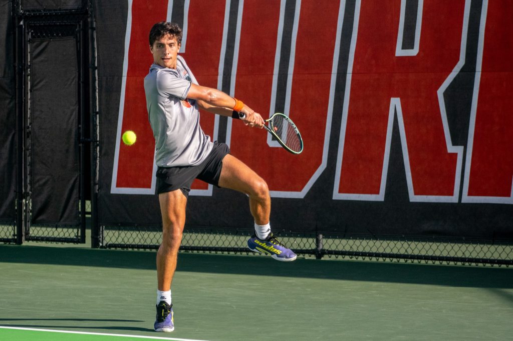 Fourth-year junior Franco Aubone returns the ball to Jake Huarte of Army West Point on Wednesday, March 9, 2022 at the Neil Schiff Tennis Center.