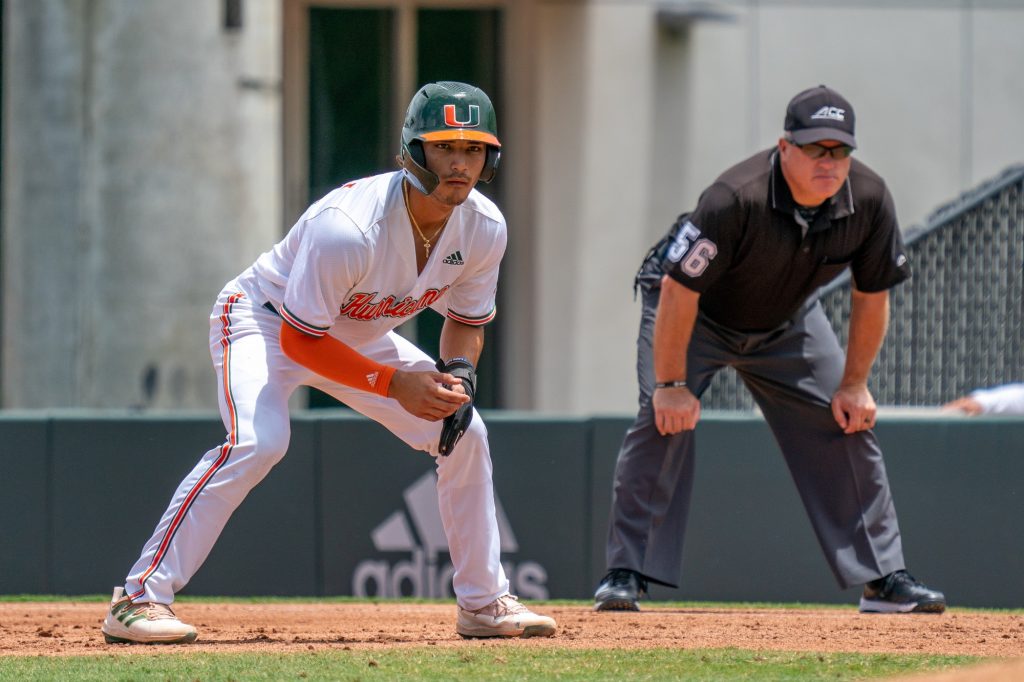Sophomore infielder Dominic Pitelli watches the pitcher from first base in the bottom of the second inning of Miami’s game versus the University of Pittsburgh at Mark Light Field on April 24, 2022.