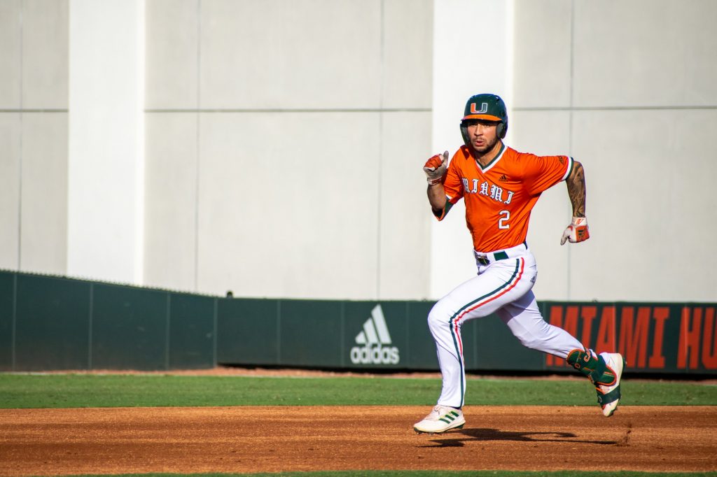 Sophomore infielder CJ Kayfus runs to second base for a single during Miami's game against Bethune-Cookman on Tuesday April 19, 2022 at Mark Light Field.