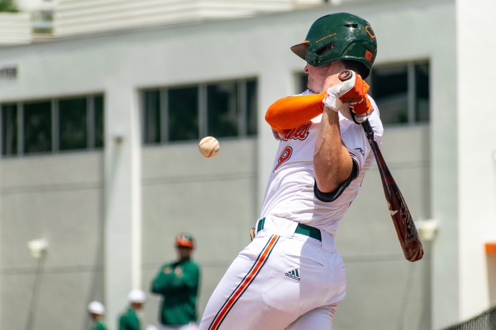 Freshman outfielder Zach Levenson hits a ball in the bottom of the fifth inning of Miami's game versus the University of Pittsburgh at Mark Light Field on April 24, 2022.