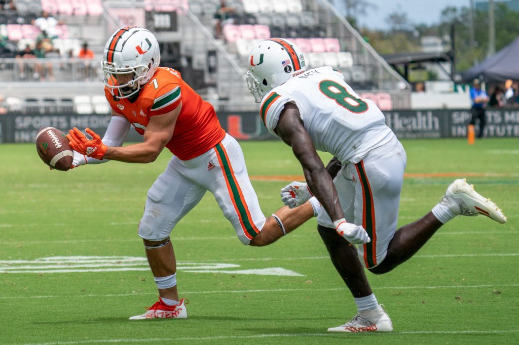 Third-year sophomore wide receiver Xavier Restrepo bobbles the ball before making the catch during Miami's Spring Game at DRV PNK Stadium on April 16, 2022.
