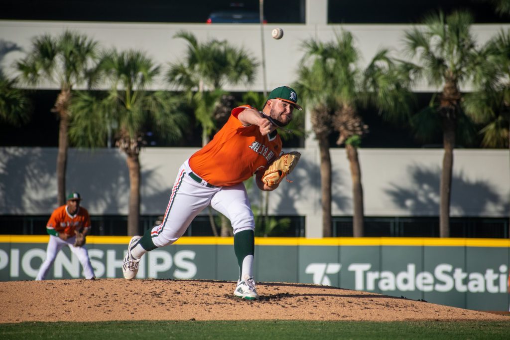 Sophomore right-handed pitcher Jake Garland pitches in the top of the first inning during Miami's Tuesday game against Stetson Univeristy at Mark Light Field on April 26, 2022.