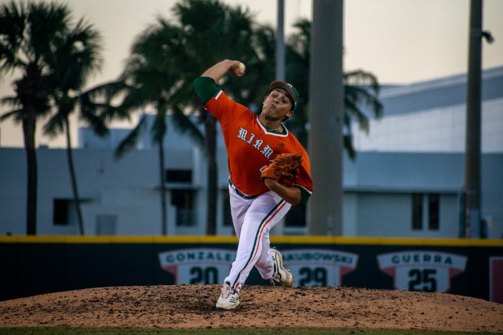 Sophomore right-handed pitcher Alejandro Torres pitches in the top of the fifth inning during Miami's game versus Stetson University at Mark Light Field on April 26, 2022.
