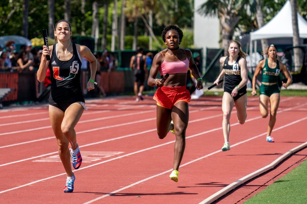 Sophomore Sierra Oliveira competes in the Women’s 4x400 Meter Relay at the Hurricane Invitational at Cobb Stadium on March 19, 2022.
