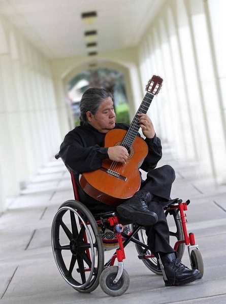 Fabian Carrera, 52, is on a mission to raise disability awareness and pay tribute to his Ecuadorian heritage through his art: guitar performance.