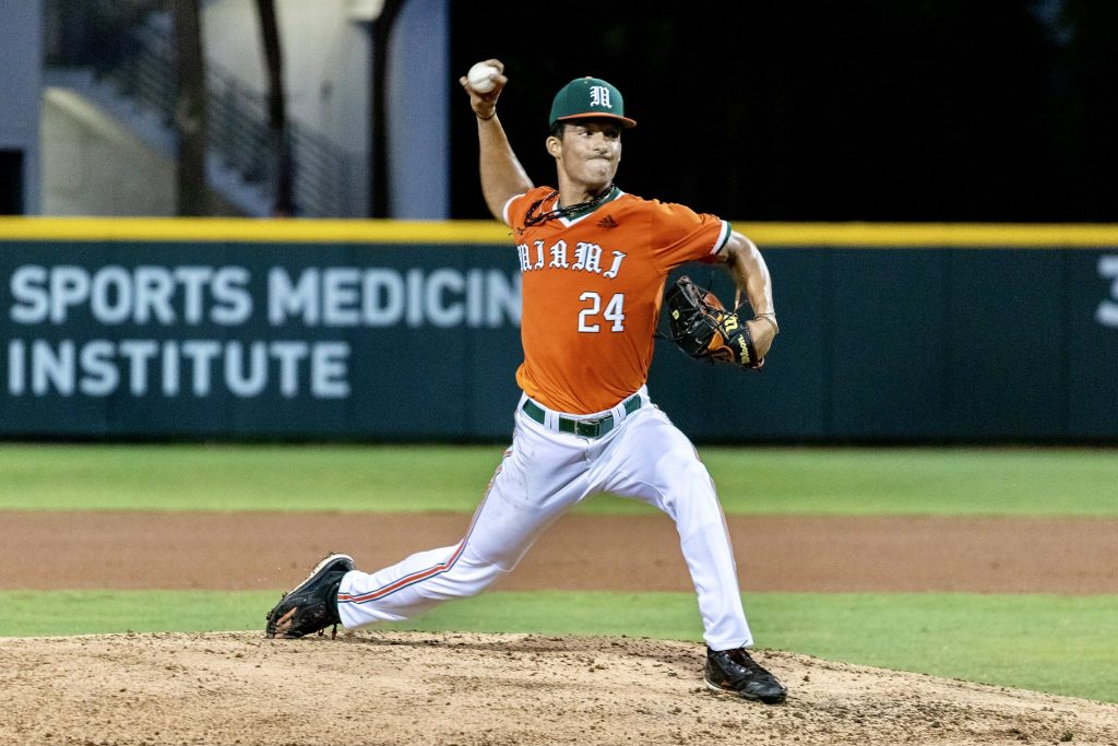 Starting pitcher Alejandro Rosario seconds away from releasing a pitch during Miami's 4-3 loss to Arizona in the NCAA regionals on June 5.