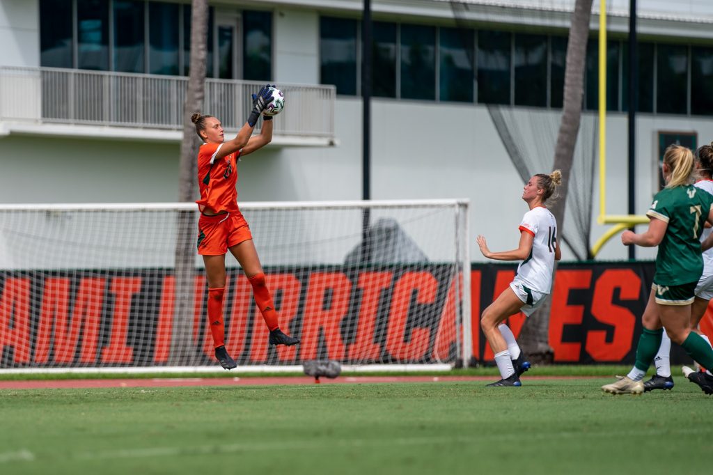 Junior goalkeeper Melissa Dagenais catches the ball during the second half of the Canes’ match versus USF at Cobb Stadium on Sept. 12, 2021.