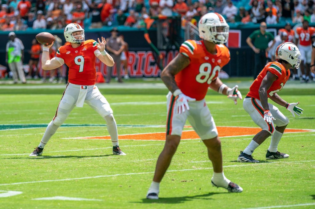 Third-year sophomore quarterback Tyler Van Dyke throws a pass to third-year sophomore wide receiver Key’Shawn Smith for a touchdown during the third quarter of Miami’s game versus the University of Southern Mississippi at Hard Rock Stadium on Sept. 10, 2022.