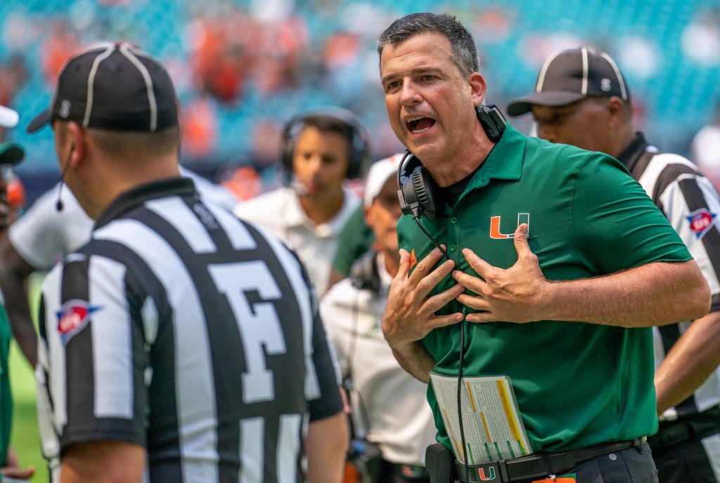 Head coach Mario Cristobal argues his case with a referee during the fourth quarter of Miami’s game versus the University of Southern Mississippi at Hard Rock Stadium on Sept. 10, 2022.