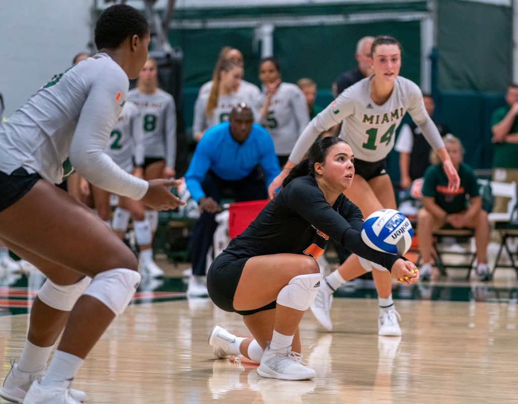 Sophomore defensive specialist Yaidaliz Rosado bumps the ball during the second set of Miami’s match versus the University of South Carolina in the Knight Sports Complex on Sept. 16, 2022.