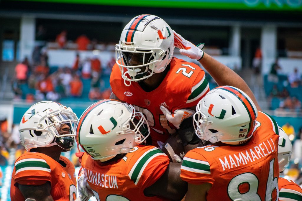 Sophomore wide reciever Henry Parrish, Jr. celebrates a touchdown with teammates during the second half of Miami's game against Southern Miss on Sept. 10 at Hard Rock Stadium.