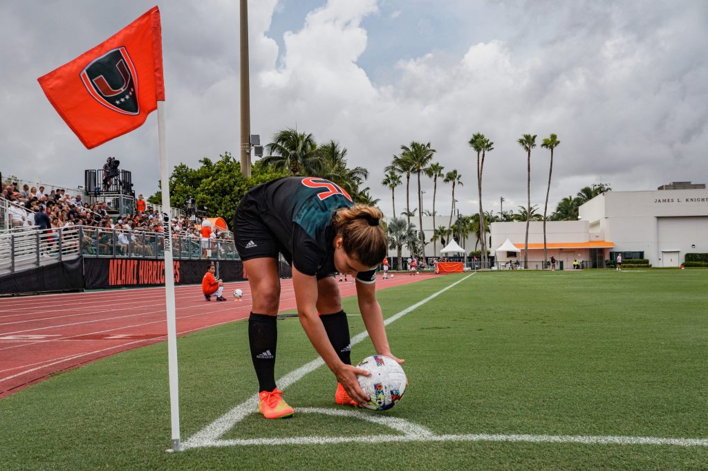 Redshirt sophomore midfielder Hannah Dawbarn prepares to take a corner kick during Miami's game against UNF on Aug 28 at Cobb Stadium.