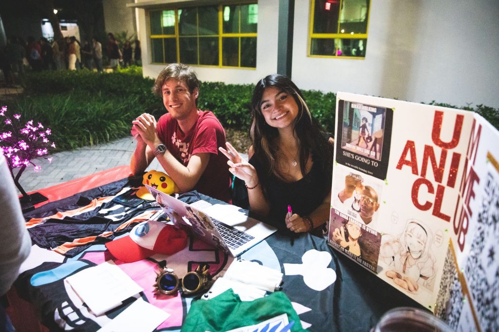 Sophomore Collin Dion and junior Alexandria Cashman table for the Anime Club at the 2022 Lantern Festival on Oct. 21 in the architecture courtyard.