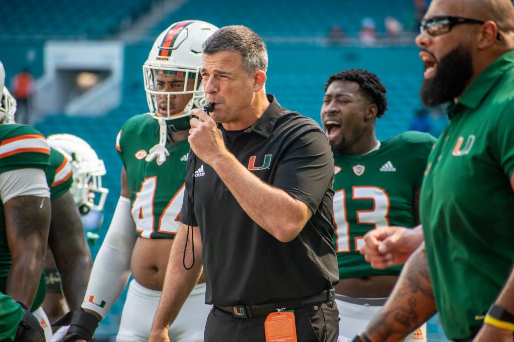 Head coach Mario Cristobal instructs the team prior to their game against Duke University on Saturday, Oct. 22 at Hard Rock Stadium.
