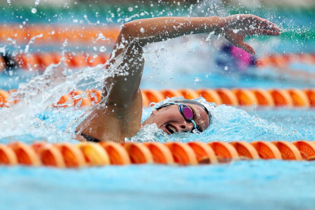 Miami's swimming team competing in its season opener against Florida International at the Whitten Center Pool on Sept. 30.