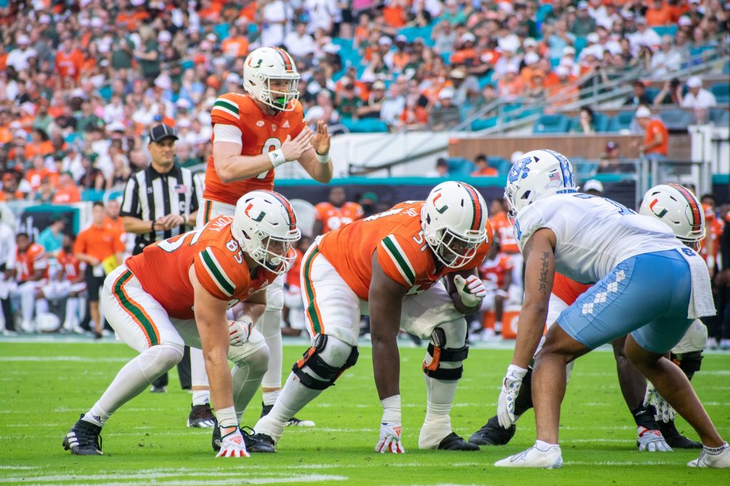 Third-year sophomore Tyler Van Dyke prepares to start a play during Miami's game against the University of North Carolina on Saturday, Oct. 8 at Hard Rock Stadium.