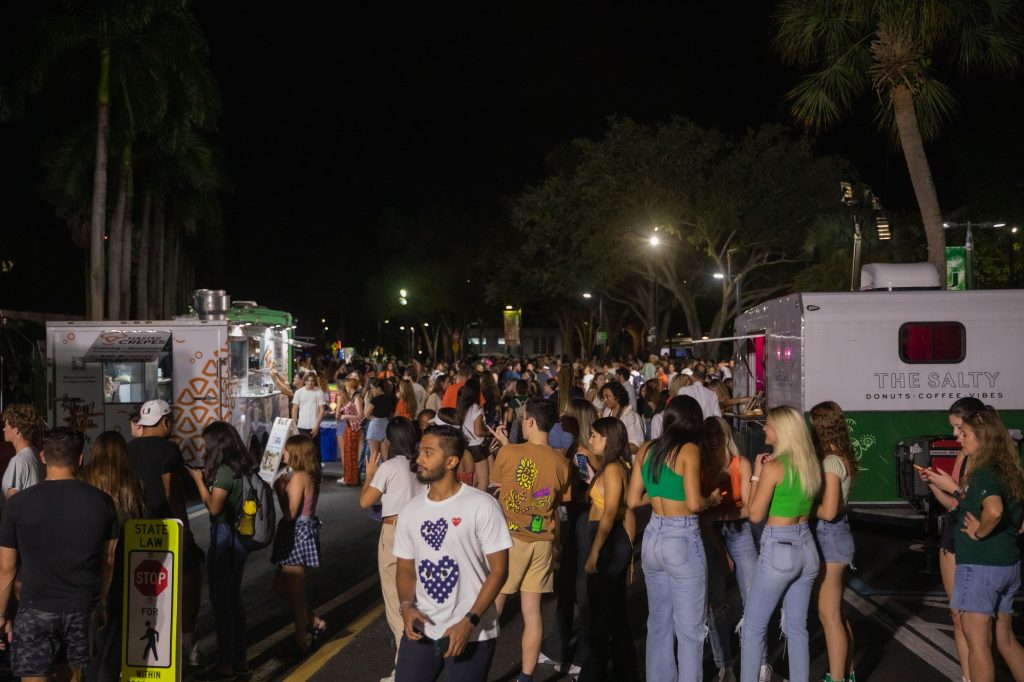 Students and alumni enjoy food trucks during the annual Hurricane Howl Block Party on Nov. 4 on Stanford Drive.