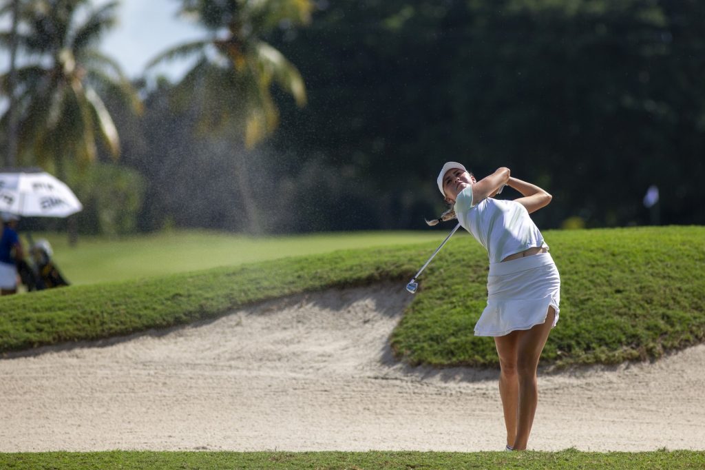 Fourth-year junior Morgan Pankow successfully hits out of the sand pit on day one of Miami’s Hurricane Invitational at the Biltmore Hotel on Monday, Oct. 31.