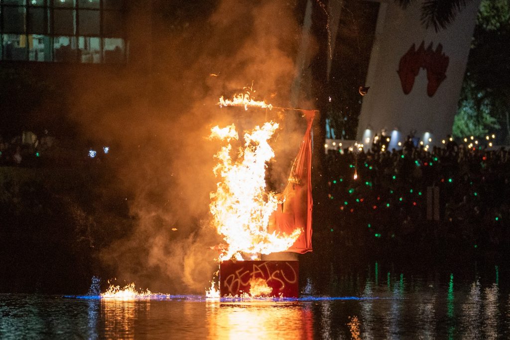 The Burning of the Boat Ceremony takes place at Lake Osceola, as part of the Homecoming Hurricane Howl evening events on Nov. 4, 2022.
