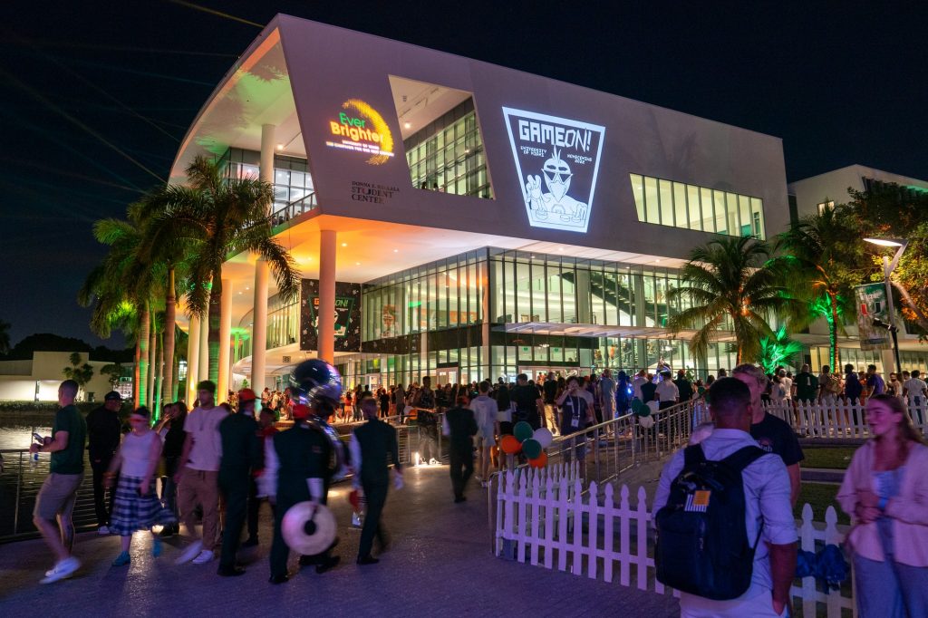 The Homecoming Theme “Game On” logo is projected onto the side of the Shalala Student Center during the Homecoming Hurricane Howl evening events on Nov. 4, 2022.
