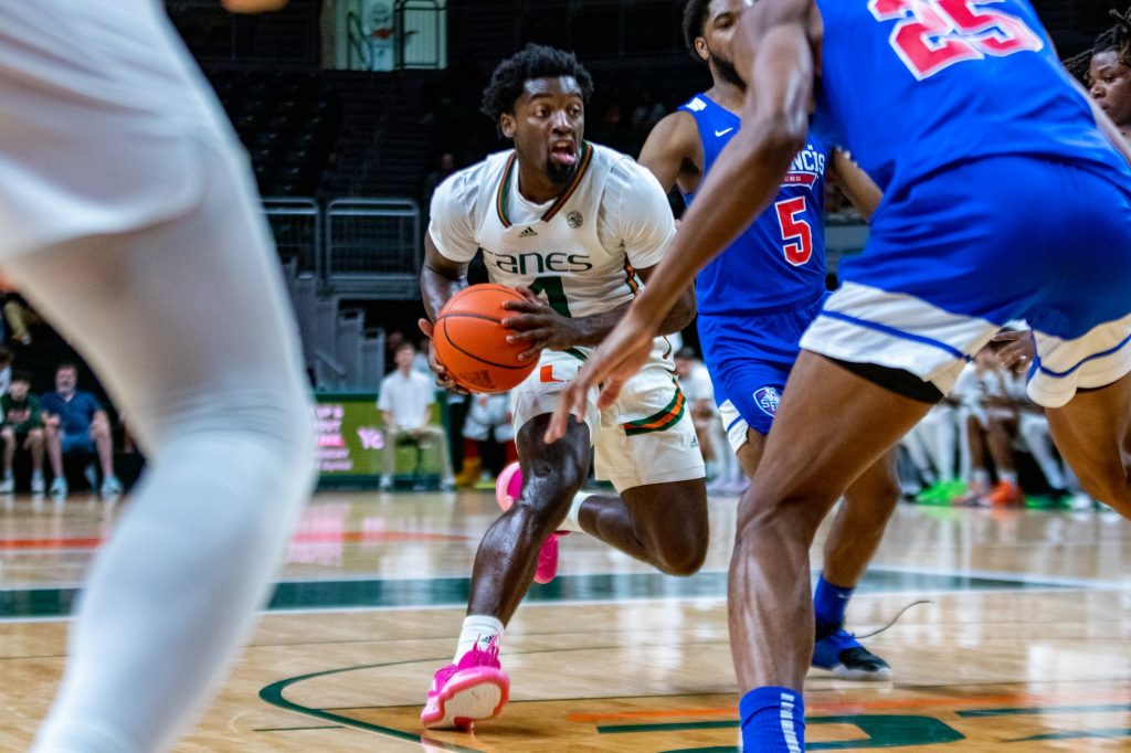 Sophomore guard Bensley Joseph drives into the lane in Miami's game against St. Francis Brooklyn on Nov. 23 at the Watsco Center.