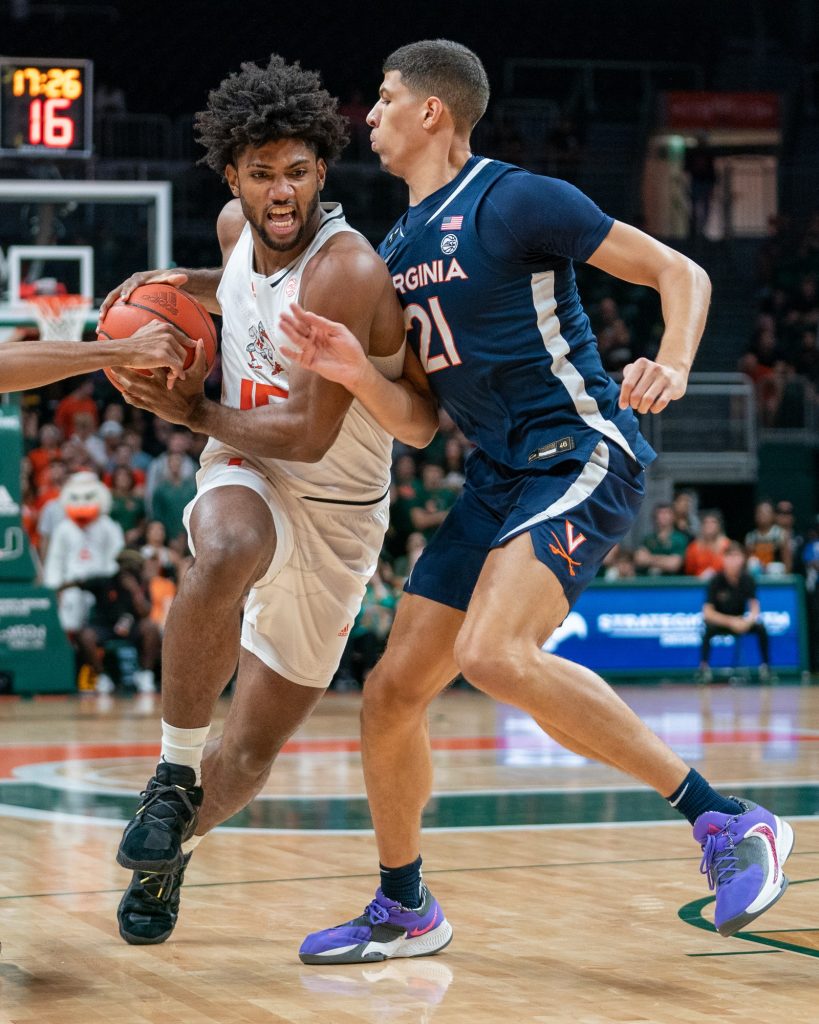 Third-year sophomore forward Norchad Omier drives to the basket during the first half of Miami’s game versus the University of Virginia in the Watsco Center on Dec. 20, 2022.