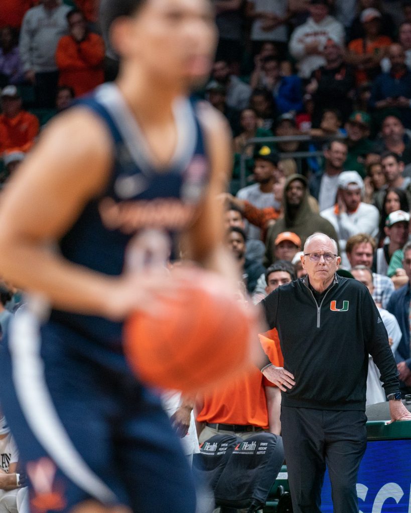 Head coach Jim Larrañaga looks on as Cavalier graduate student guard Kihei Clark shoots a free throw during the final minutes of Miami’s game versus the University of Virginia in the Watsco Center on Dec. 20, 2022.