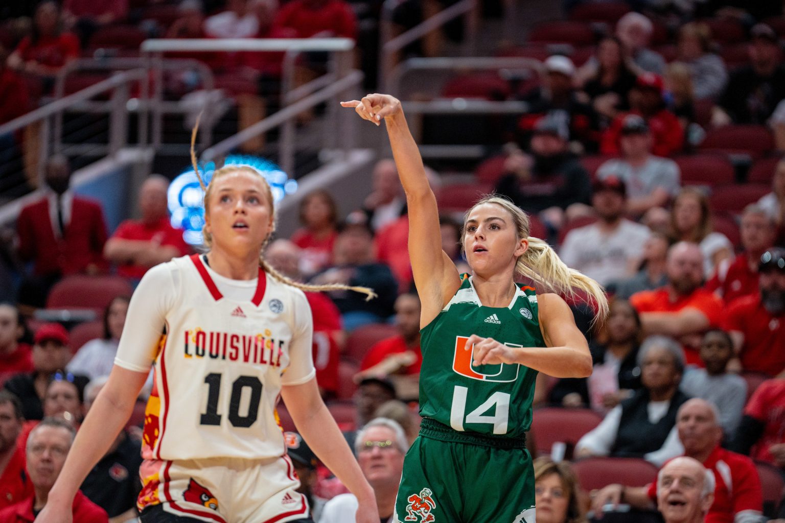 Cavinder eclipses 2,000 points, Miami loses road finale to Louisville ...
