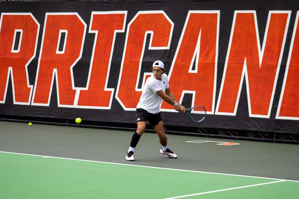 Fifth-Year Senior Franco Aubone prepares to hit the ball back to his opponent from Florida Atlantic University at Neil Schiff Tennis Center on February 12.