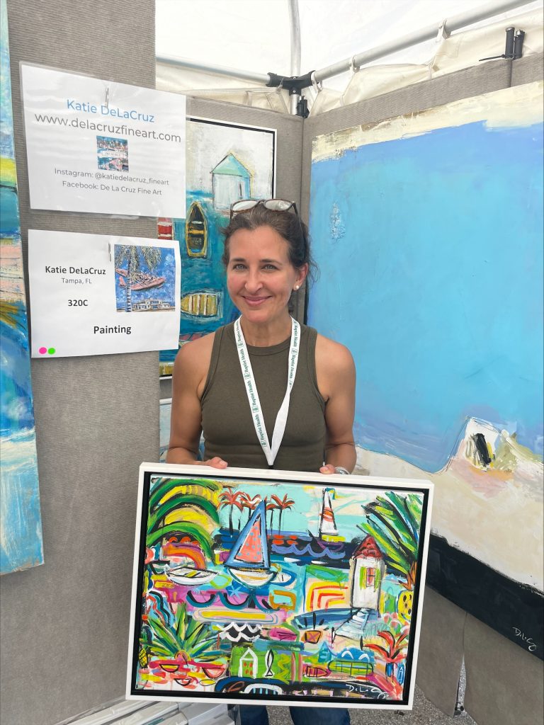 Tampa-based artist Katie DeLaCruz shows one of her "tropicals" at the Coconut Grove Arts Festival.