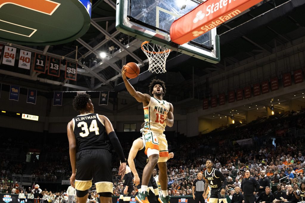Third-year sophomore forward Norchad Omier dunks in the first half of Miami’s game against Wake Forest at the Watsco Center on Saturday, Feb. 18.