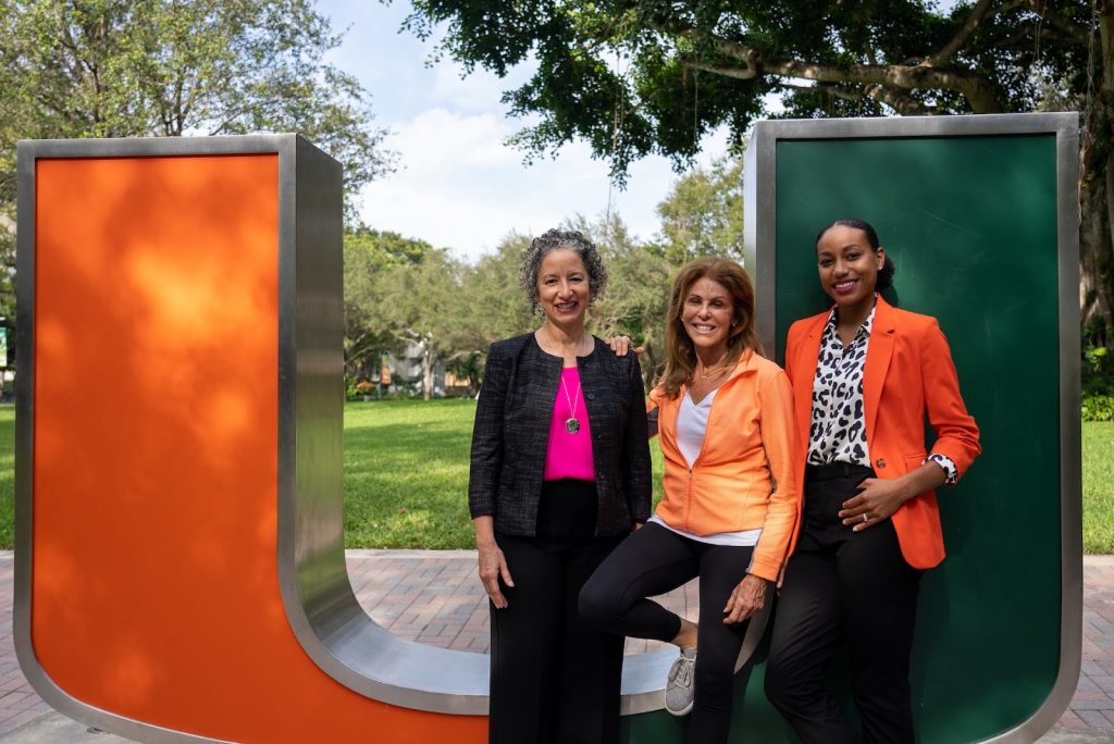 From left to right, Dr. Laura Kohn-Wood, Leslie Miller Saiontz and Jasmine Calin-Micek pose in front of the U.