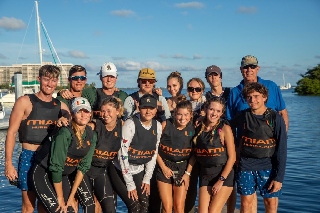 The University of Miami’s club sailing team poses before a practice in Biscayne Bay.
