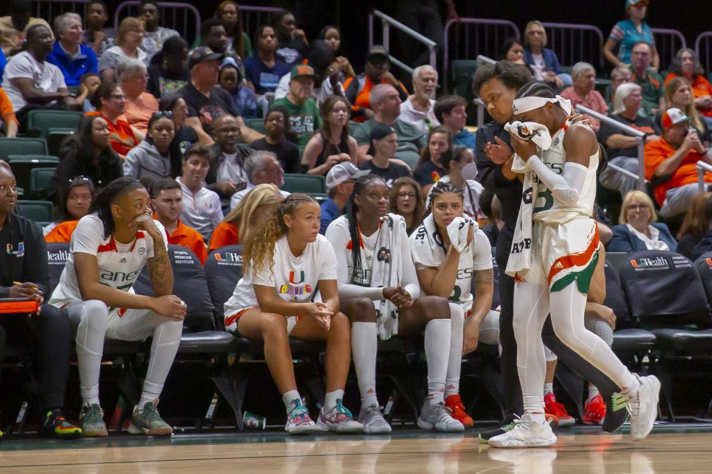 Sophomore guard Lashae Dwyer walks off the court after a nose injury in the third quarter of Miami’s game against FSU in the Watsco Center on Feb. 9, 2023.