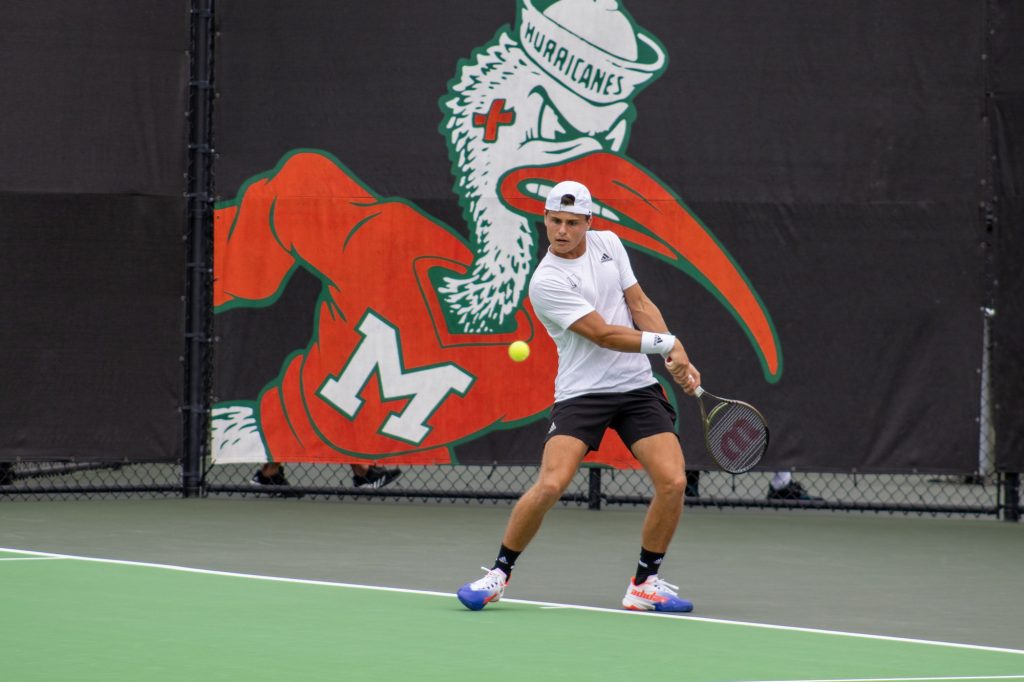 Freshman Antonio Prat prepares to hit the ball across the court during the singles matches against Florida Atlantic University on February 12 at Neil Schiff Tennis Center.