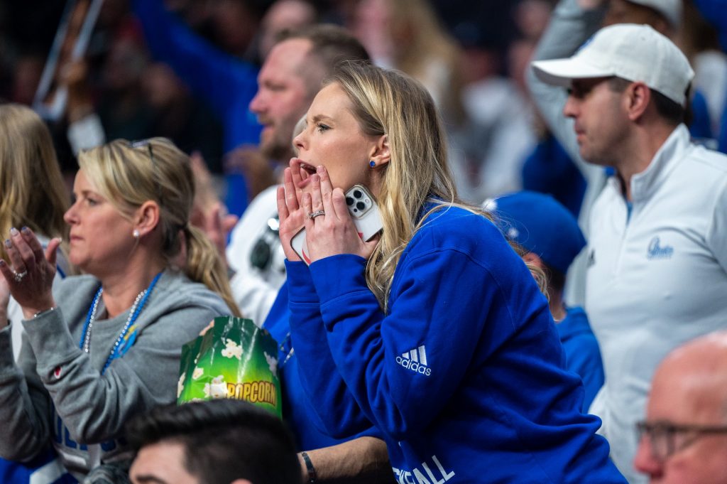 A Drake University fan cheers on during the first half of Miami's win on Friday, March 17 at the MVP Arena.