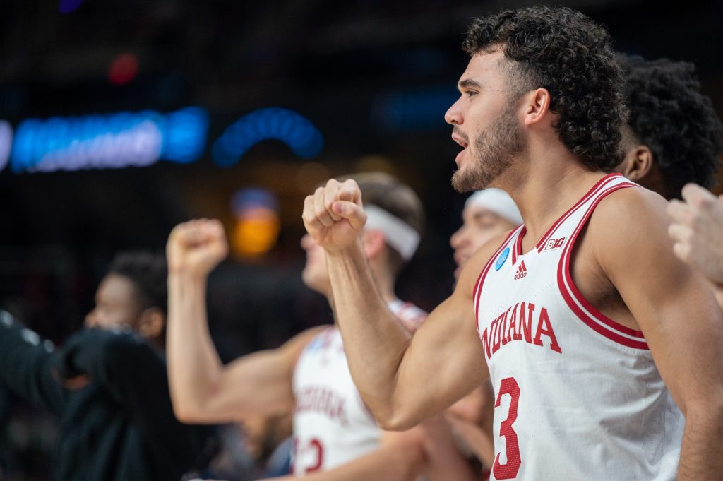 Third-year sophomore guard Anthony Leal cheers on his teammates during Indiana's loss to Miami in the Round of 32 on Sunday, March 19 at the MVP Arena.