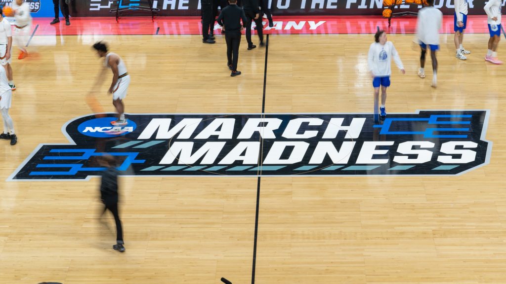 The fifth-seeded Miami Hurricanes and 12th-seeded Drake University Bulldogs warm up before their Round of 64 matchup in MVP Arena in Albany, N.Y. on March 17, 2023.