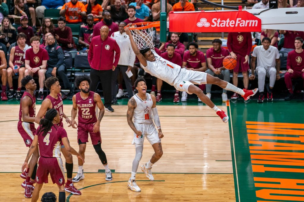Fourth-year junior forward Anthony Walker dunks during the first half of Miami’s game versus Florida State University in the Watsco Center on Feb. 25, 2023.