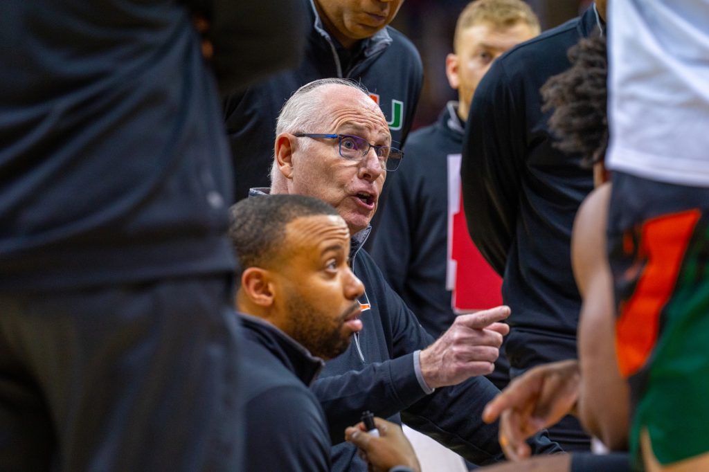 Head coach Jim Larrañaga speaks to his team during a timeout in the second half of Miami’s Sweet 16 matchup against the University of Houston in the T-Mobile Center in Kansas City, MO on March 25, 2023.