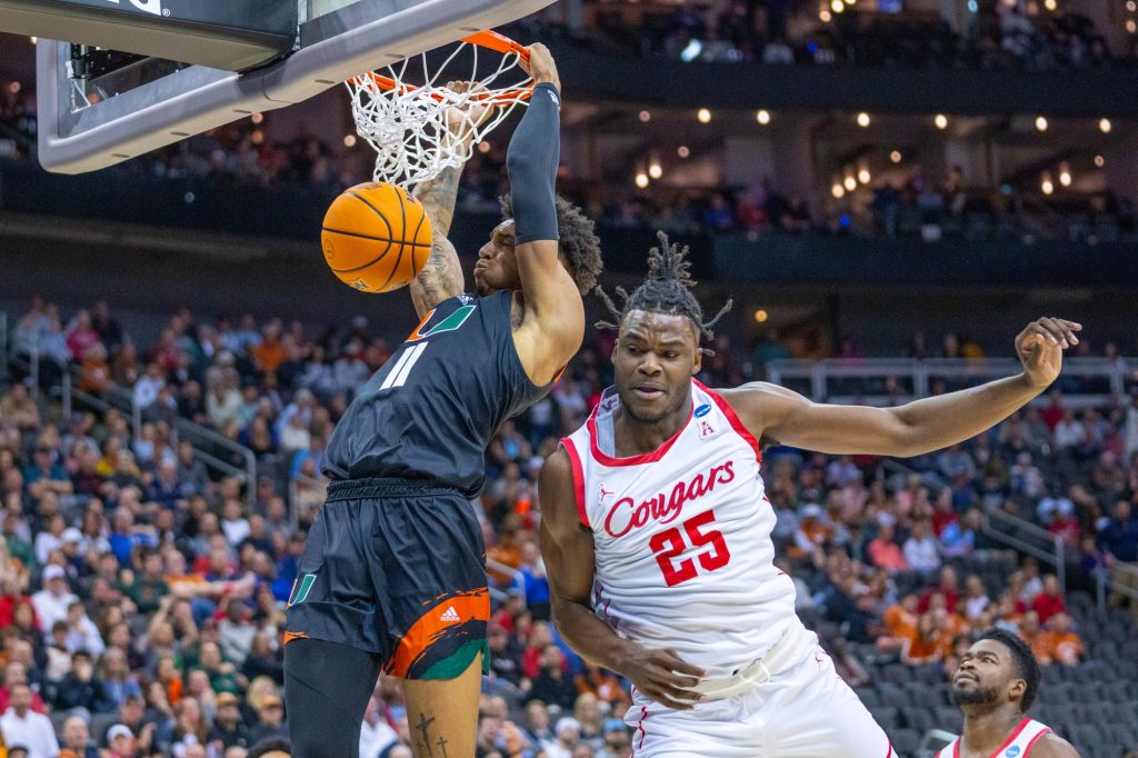 Fifth-year senior guard Jordan Miller dunks during the first half of Miami’s Sweet 16 matchup against Houston in the T-Mobile Center in Kansas City, MO on March 24, 2023.