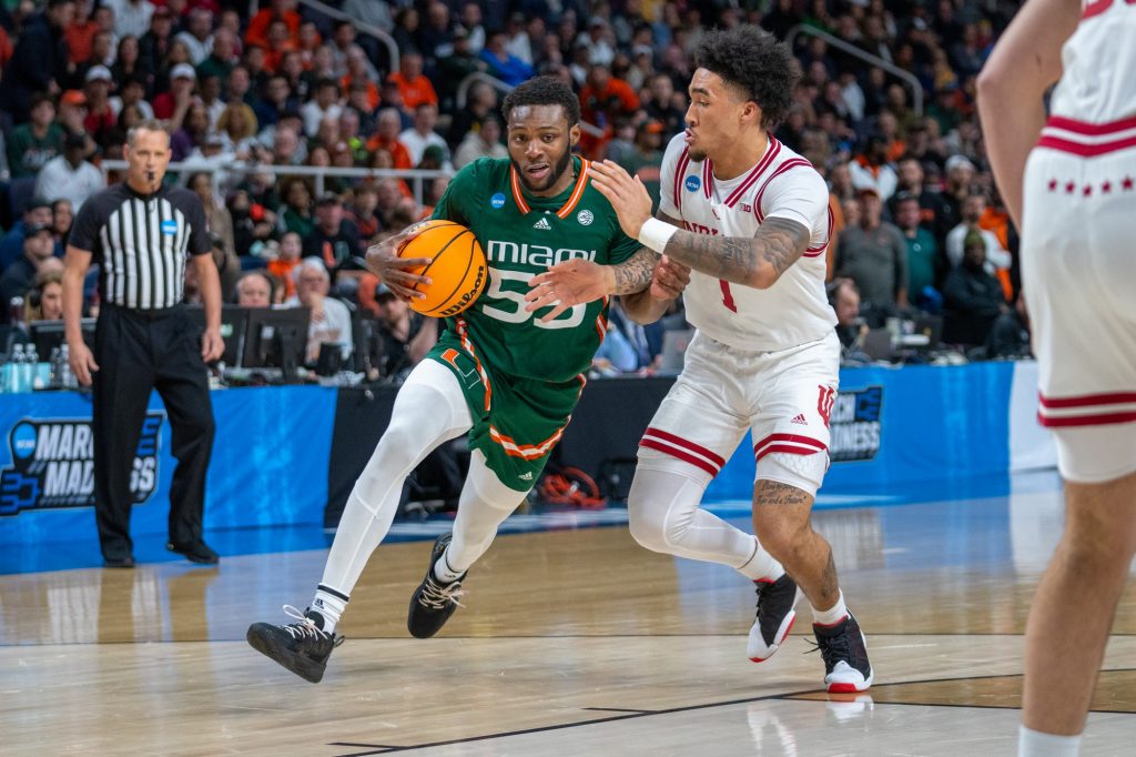 Sophomore guard Wooga Poplar drives to the basket during the first half of Miami’s Round of 32 matchup against Indiana University in MVP Arena in Albany, N.Y. on March 19, 2023.