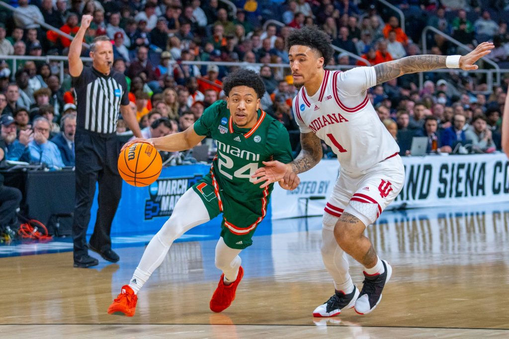 Third-year sophomore guard Nijel Pack drives to the basket during the first half of Miami’s Round of 32 matchup against Indiana University in MVP Arena in Albany, N.Y. on March 19, 2023.