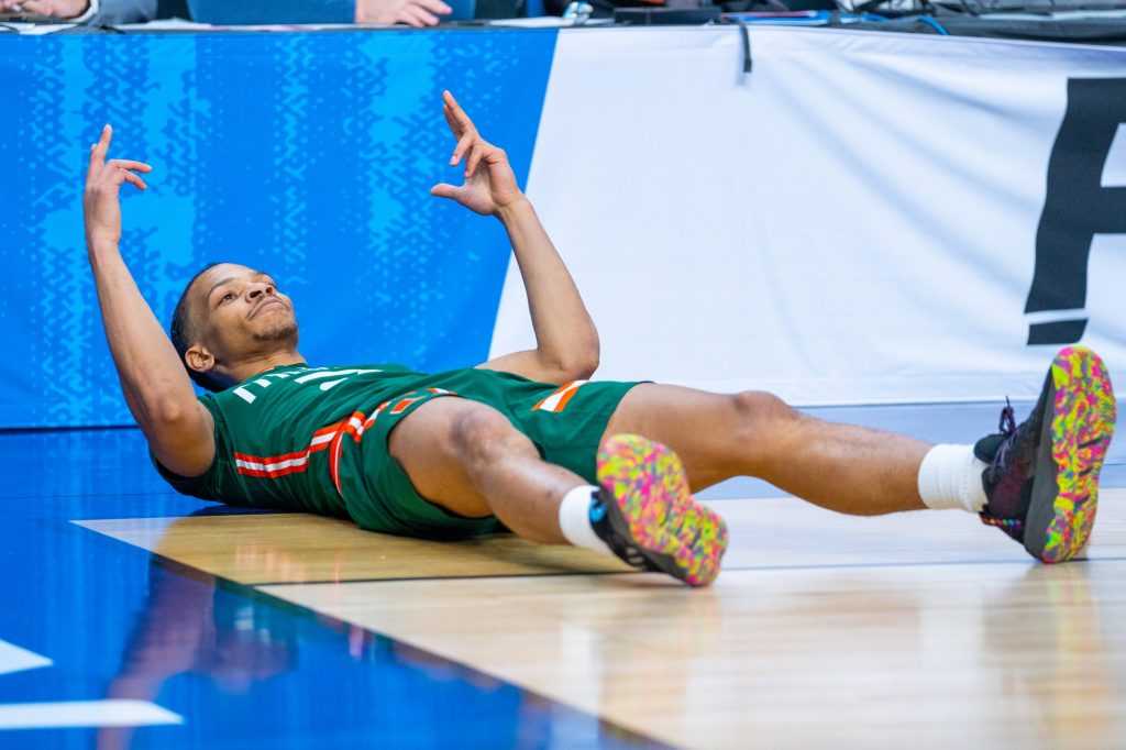 Fourth-year junior guard Isaiah Wong celebrates after scoring during the first half of Miami’s Round of 32 matchup against Indiana University in MVP Arena in Albany, N.Y. on March 19, 2023.